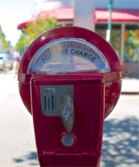 A parking meter marked Positive Change, symbolizing Tax Edge's community giving